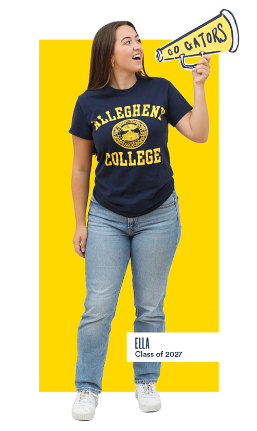 Girl standing with Allegheny College shirt and holding a megaphone prop, looking to the side in an excited way